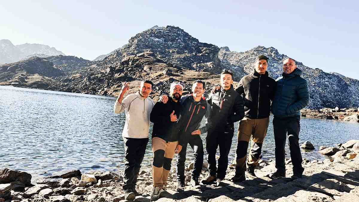 Foreign trekkers enjoying the moment infront of Gosaikunda Lake Nepal