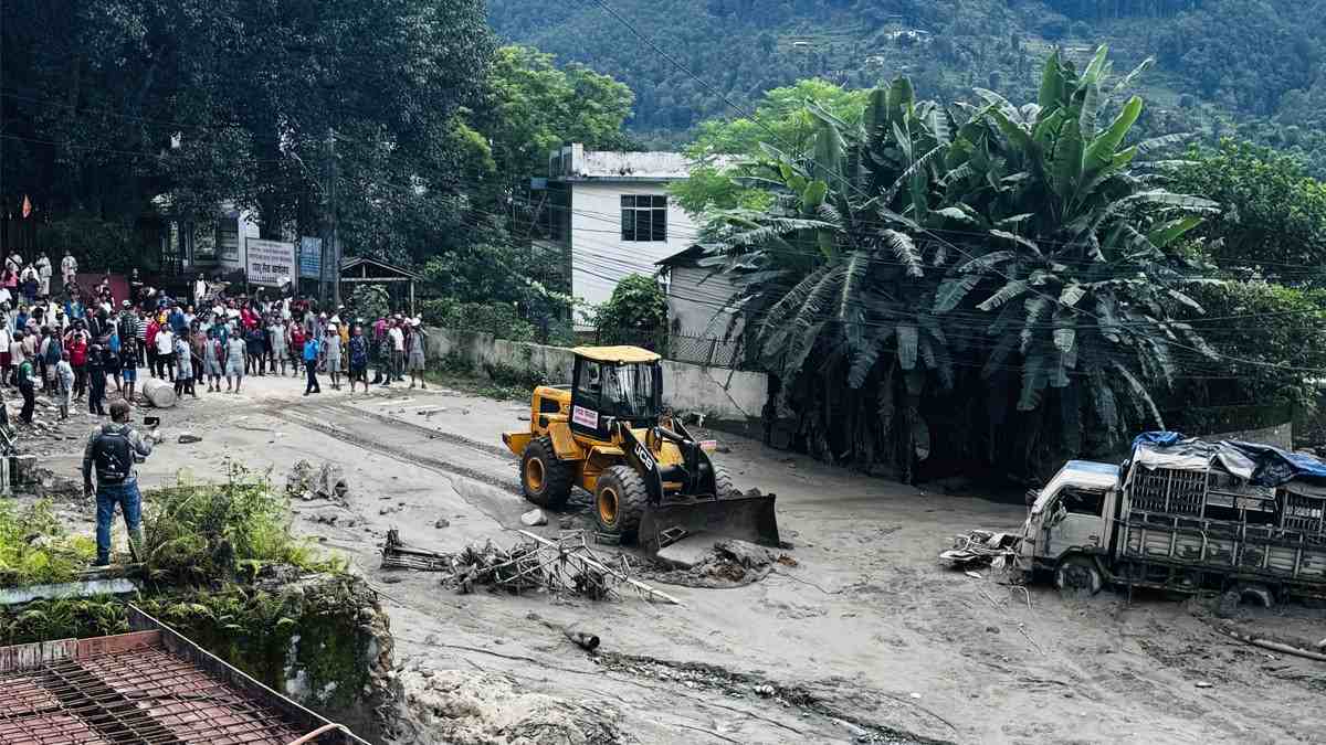 Mud removing after devastating flood in Nepal