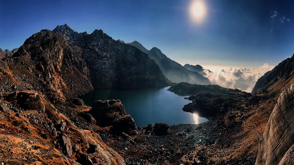 The sacred alpine lake of Gosaikunda surrounded by rugged rocky peaks