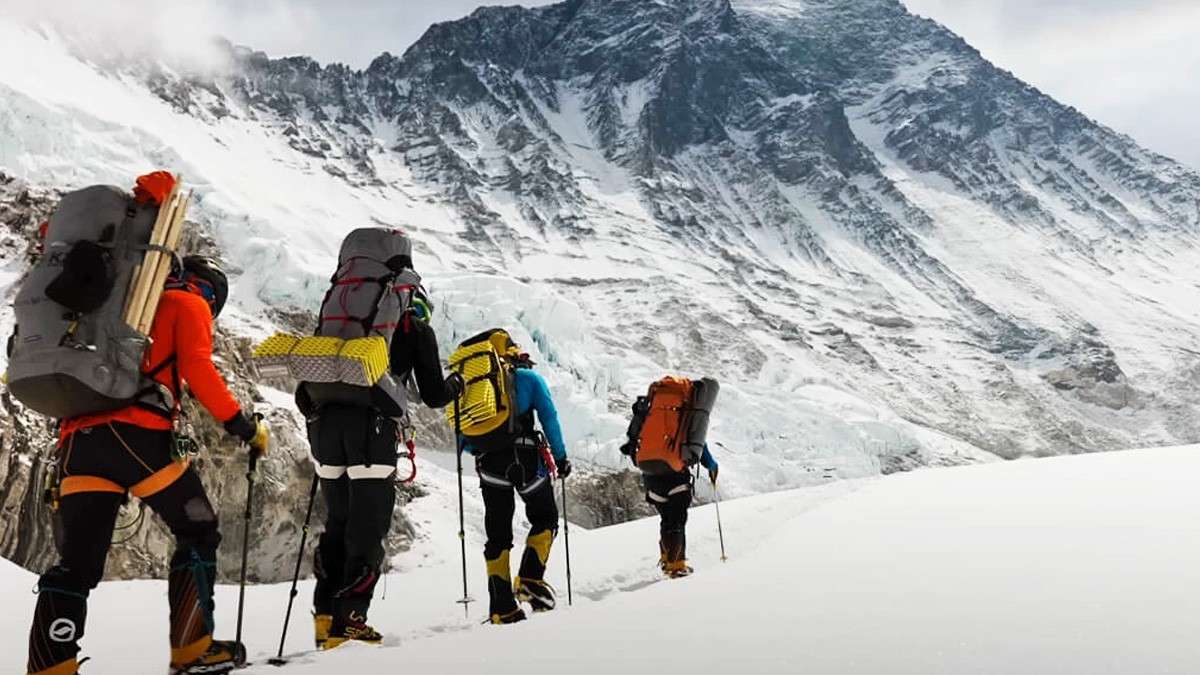 Trekkers climbing Yala Peak