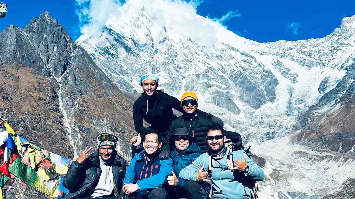 Trekkers giving pose in Yala Peak