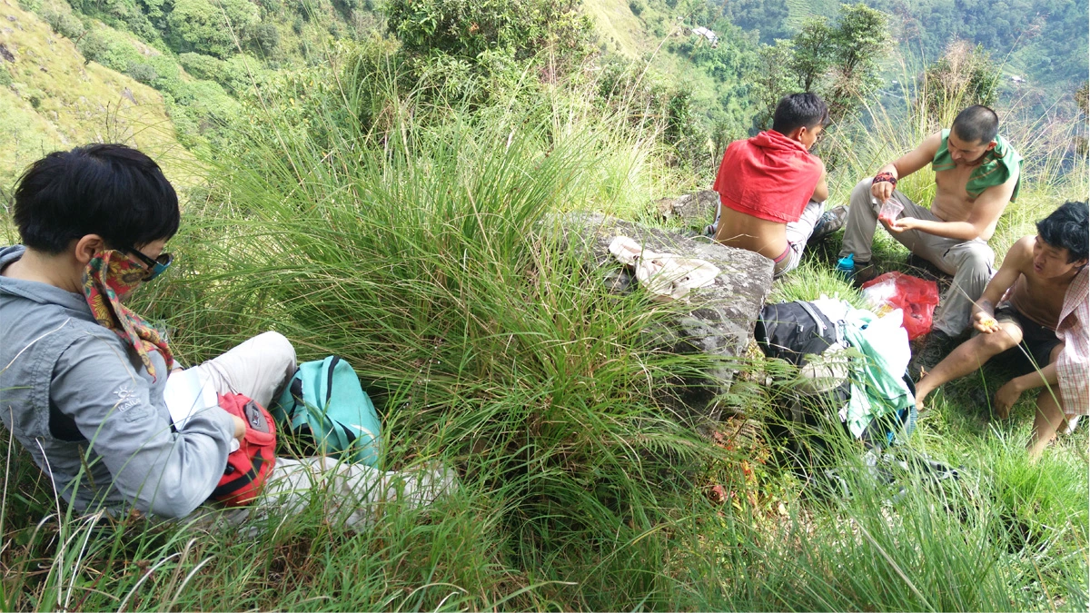 Trekkers relaxing in soothing tenmperature of Autumn season trek in Kanchenjunga Circuit