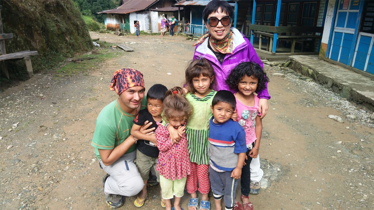 Happiness with local kids after several hours of walking