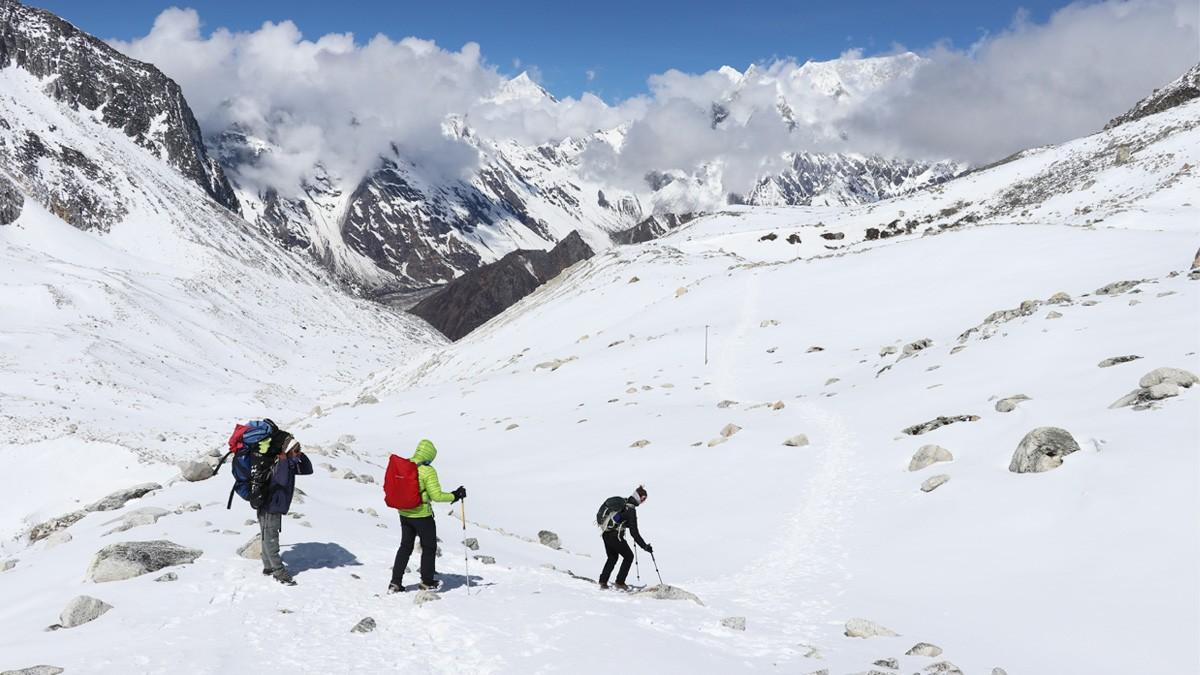 Trekkers dealing with heavy snow in Manaslu Circuit Area