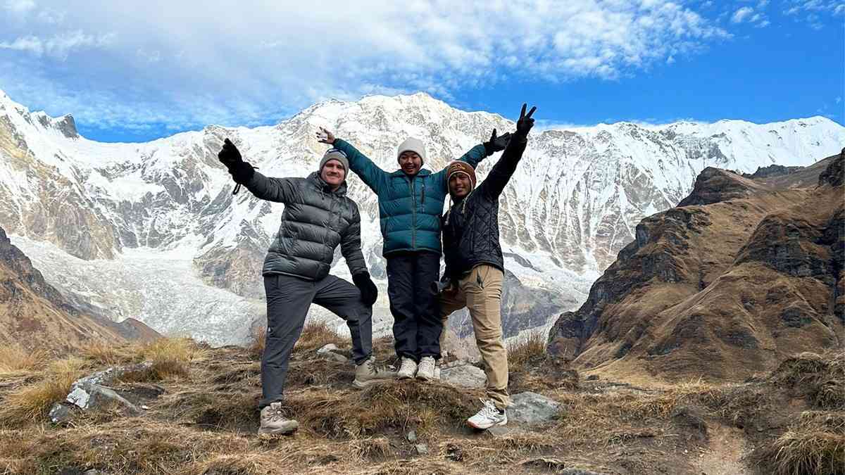 Trekkers enjoying snow in Muktinath Trail