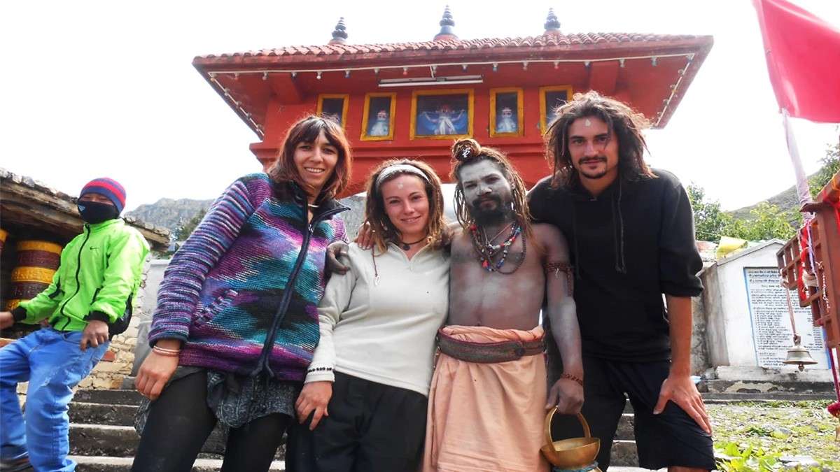 Foreign trekkers with holy baba in Muktinath Temple Nepal