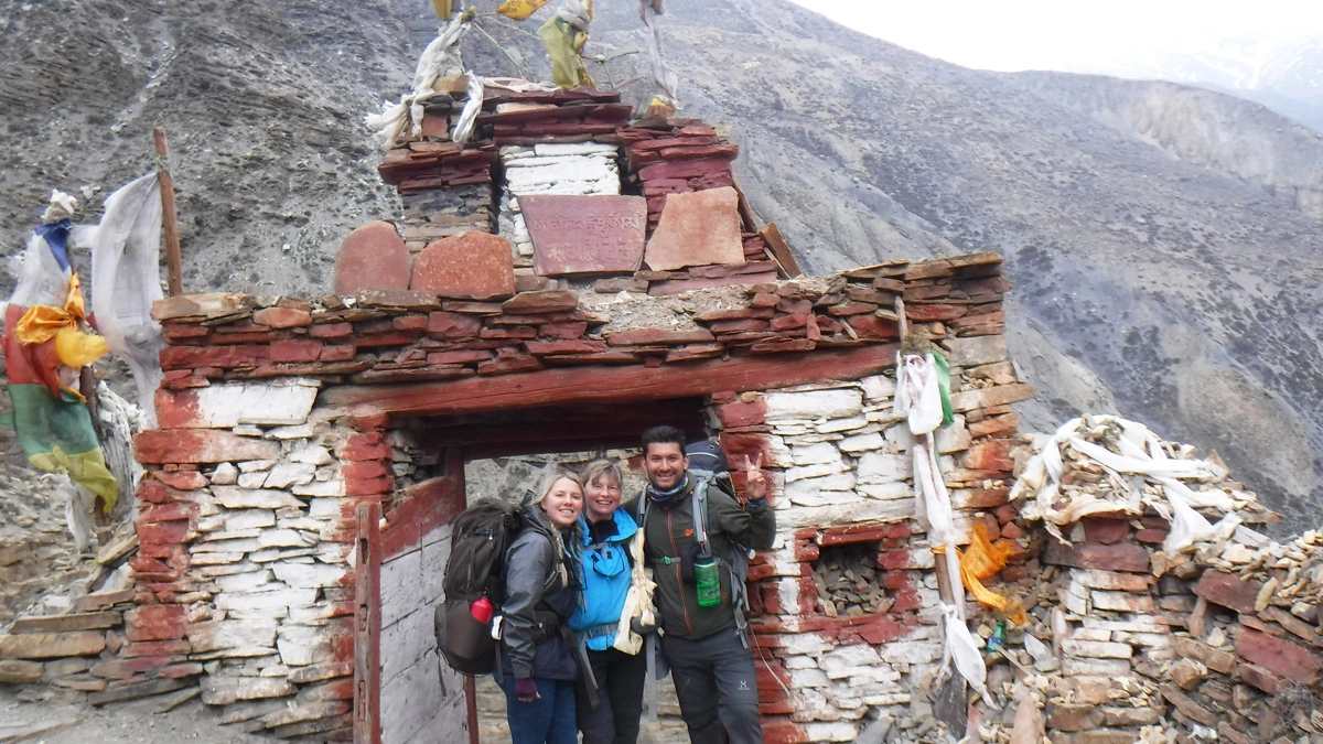 Tourists infront of traditional accommodation in Nar Phu Valley