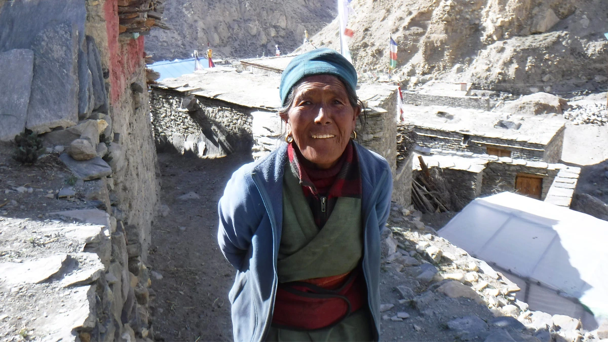 Old lady with bright smile in Nar Phu Valley