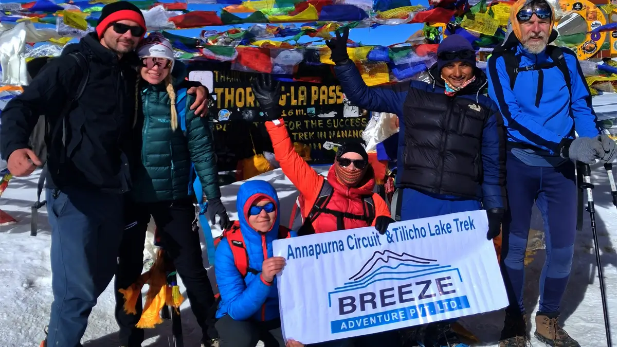 Breeze Adventure trekking group at Thorong La Pass on the Annapurna Circuit and Tilicho Lake Trek