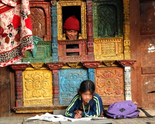 Mountain Kid Doing Homework At Home